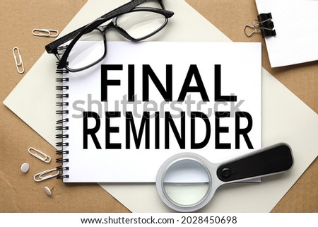 Final Reminder. text on white notepad on craft background