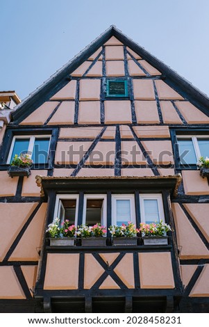 Windows of a house in Eguisheim, Alsace, France. colorful old house France