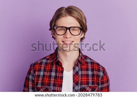 Portrait of positive nice attractive guy look camera toothy beaming smile on purple background