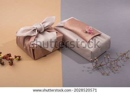 Korean traditional wrapping cloth packaging. furoshiki packaging gift box Royalty-Free Stock Photo #2028520571