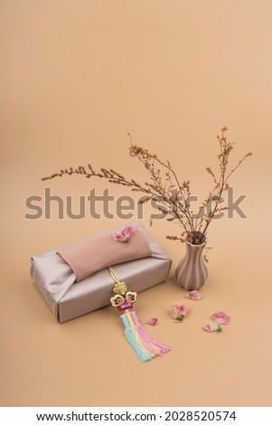 Korean traditional wrapping cloth packaging. furoshiki packaging gift box Royalty-Free Stock Photo #2028520574