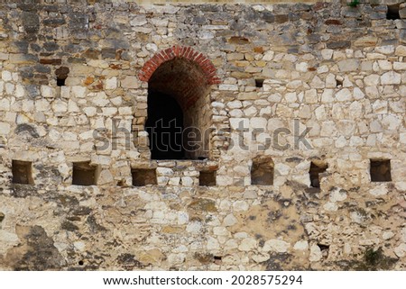 Fortress window. Architectural medieval background with copy space for text or lettering.