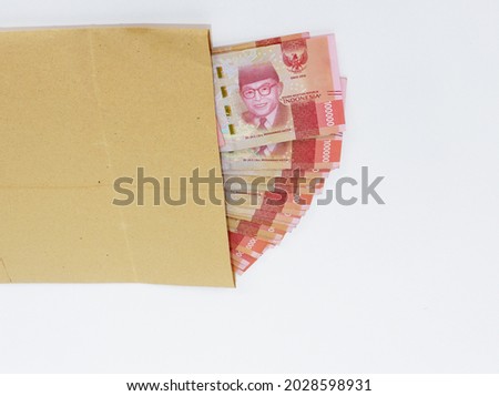 money in envelope  on white background.