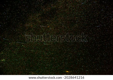 Satellite internet constellation in night sky

