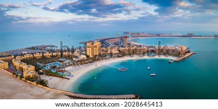 Marjan Island seafront reclaimed land artificial island in emirate of Ras al Khaimah in the United Arab Emirates aerial view at sunrise Royalty-Free Stock Photo #2028645413