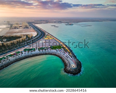 Marjan Island seafront reclaimed land artificial island in emirate of Ras al Khaimah in the United Arab Emirates aerial view at sunrise Royalty-Free Stock Photo #2028645416
