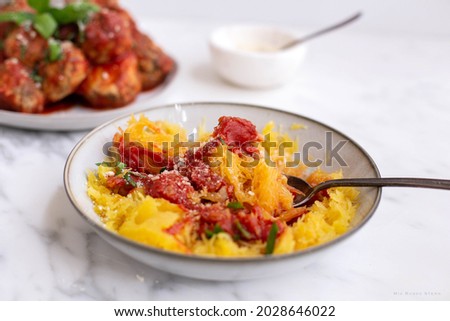 Spaghetti Squash with Marinara and Meatballs Royalty-Free Stock Photo #2028646022