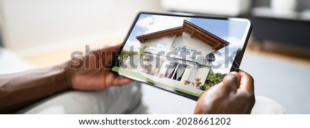 Looking To Buy House On Tablet Computer
