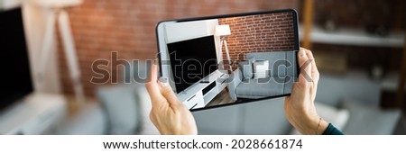 Real Estate House Virtual Tour Video On Tablet Royalty-Free Stock Photo #2028661874