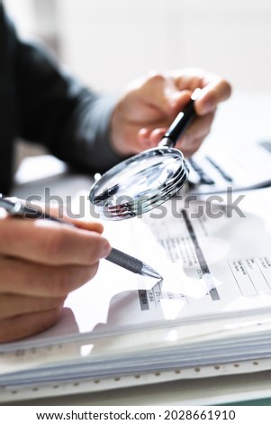 Businessman Finance Investigation Using Magnifying Glass. Fraud And Audit
