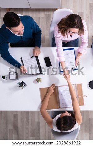 Employer Hiring People. Staffing And Recruitment For Job Royalty-Free Stock Photo #2028661922