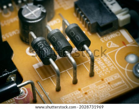 Semiconductor diode in the circuit board Royalty-Free Stock Photo #2028731969