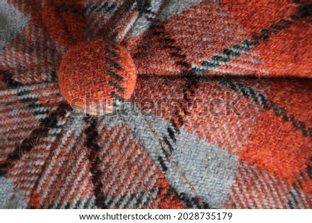 plaid fabric of cap macro photo background