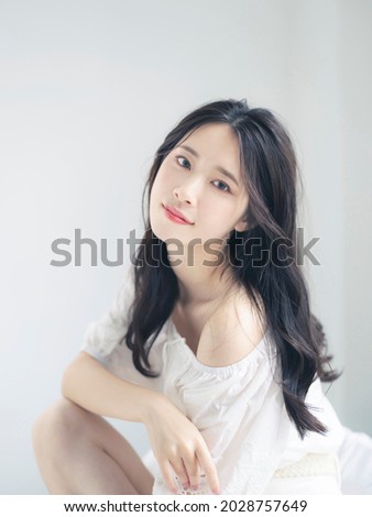 Fashion concept of young asian woman. Beauty photo. Cosmetics. Skin care. Body care. Royalty-Free Stock Photo #2028757649