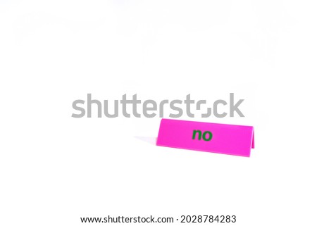 Table sign saying no on white background isolated close up