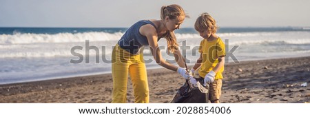 Mother and son are cleaning up the beach. Natural education of children BANNER, LONG FORMAT