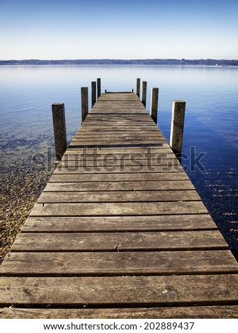 old wooden jetty at a lake
