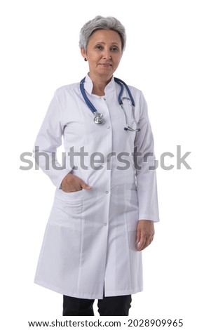 Portrait of smiling mature Asian doctor with stethoscope isolated over white background