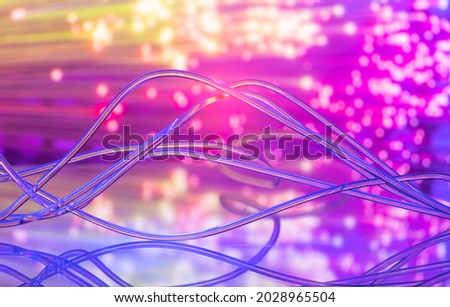 Neon whirlpool of fiber optic cable  with curved turns from streams of lines