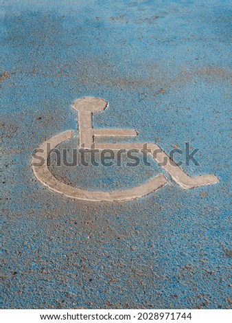 Abandoned disabled parking lot. Concept handicap, little importance that gives