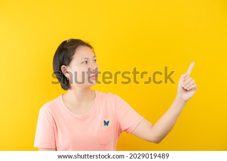 Closeup photo of amazing short hairdo lady looking up empty space deep thinking creative person arm on yellow color background