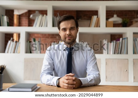 Project leader, coach, financial advisor portrait, profile picture of intelligent executive manager sit at workplace looks at camera. Videocall event, stream, webinar, virtual meeting, counsel concept