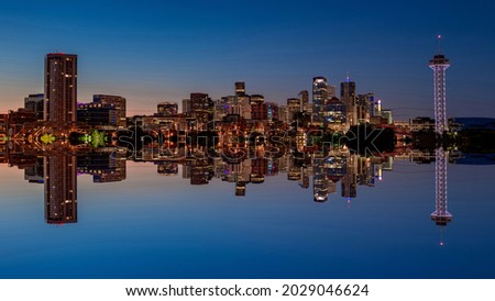 Night over and under the city of Denver as an abstract mirror image 