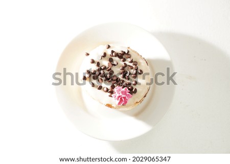 White Donut shot with icing and chocolate
