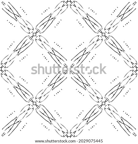 Seamless abstract pattern.Black lace on white background.Black and white graphics. Imitation lace. For design and decoration of fabric, paper, Wallpaper and packaging.Grid pattern.