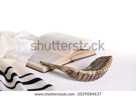 Rosh Hashanah. Yom Kippur. Tallit, shofar, torah on a white background. Isolated Royalty-Free Stock Photo #2029084637