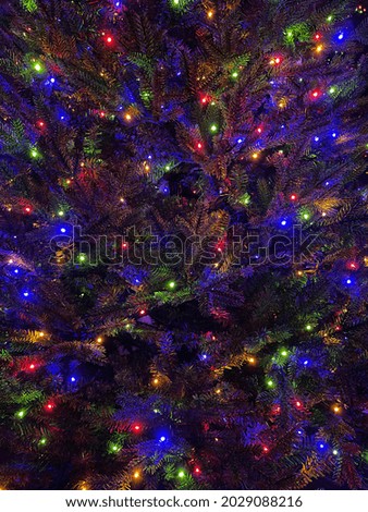 Close up of LED lights on artificial Christmas tree