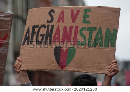 SAVE AFGHANISTAN placard at a STOP KILLING AFGHANS protest in London Royalty-Free Stock Photo #2029121288