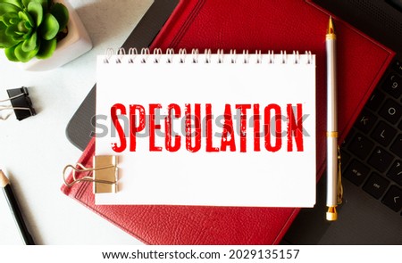 Speculation memo written on a notebook with pen. Royalty-Free Stock Photo #2029135157