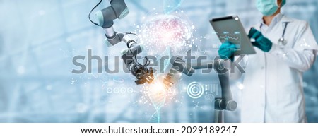 Doctor checking brain testing result with robotics on virtual interface on laboratory background, innovative technology in science and medicine concept. Royalty-Free Stock Photo #2029189247