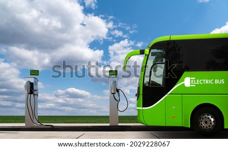 Electric bus with charging station. Concept Royalty-Free Stock Photo #2029228067
