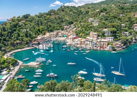 Panoramic overview of Portofino seaside area, harbour with numerous of yachts and ships, view from Castello Brown, Liguria, Italy
