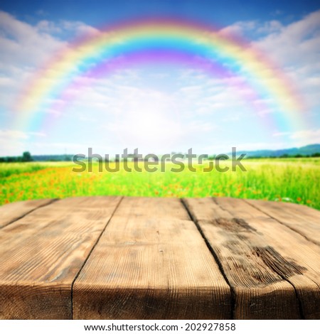 wooden retro table and rainbow 