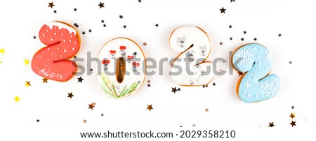 2022 set of gingerbread biscuits in shape of numbers of new year on white background. Banner size