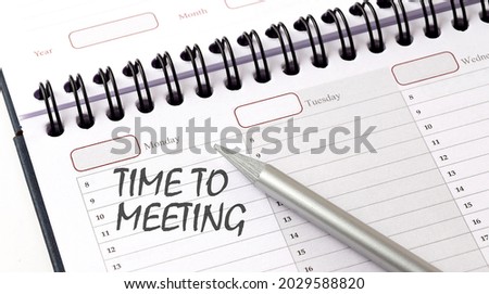 TIME TO MEETING on planner with pencil, business concept
