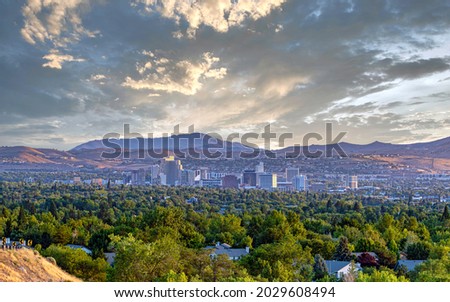 Cityscape of Reno Nevada with a dramatic sky. Royalty-Free Stock Photo #2029608494