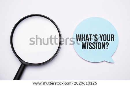 What is your Mission speech bubble and black magnifier isolated on the yellow background.