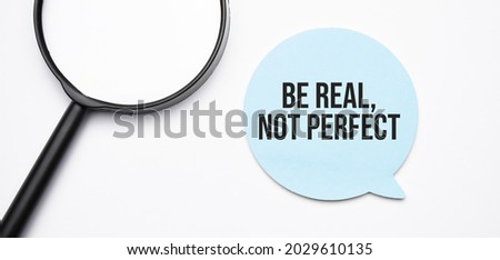 Be Real, not Perfect speech bubble and black magnifier isolated on the yellow background.