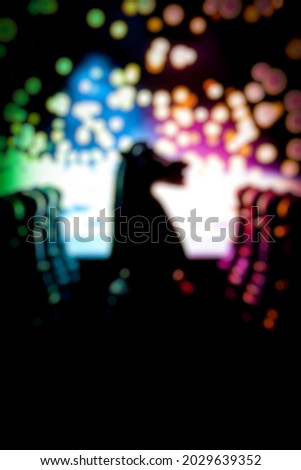 Defocused abstract background of knight and pawns with lights