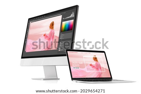 Modern desktop and laptop computers with sample software interfaces on the screen, isolated on white Royalty-Free Stock Photo #2029654271