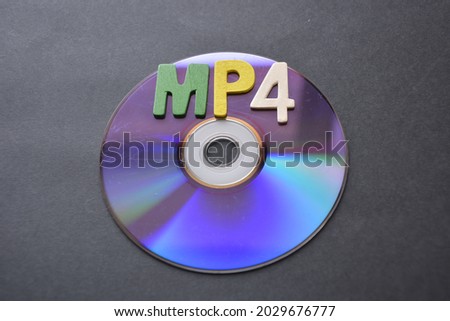 shot of a disc with the inscription composed of a mp4 anagram