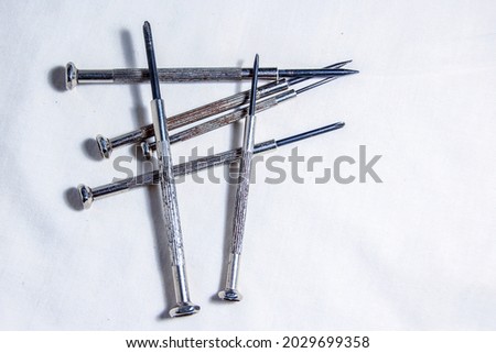 Set of small metal screwdrivers