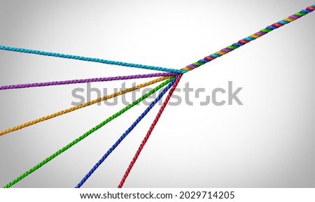 Business teams success and connecting together and unity teamwork concept as a metaphor for joining a partnership of diversity as diverse ropes connected together and working collaboration. Royalty-Free Stock Photo #2029714205