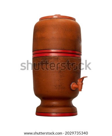 Clay filter. Brazilian design "Filtro de barro". Photo isolated over white background. Houses from Brazil. Ceramic, craft. Royalty-Free Stock Photo #2029735340