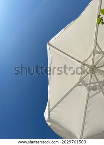 Under view of a pool umbrella