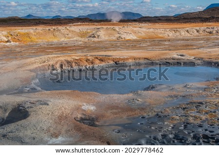 The Hverir, a geothermal spot with bubbling pools of mud and steaming fumaroles in Iceland
